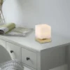 LED Tischleuchte messing farbig Würfelform Touchdimmer zeitloses Design
